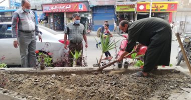 صور.. حملة لترميم وتجميل أحواض الزهور والأشجار بشوارع طنطا