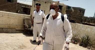 تعقيم وتطهير 3450 واجهة منزل ومحل ببولاق الدكرور للوقاية من فيروس كورونا..صور