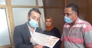صيادلة شمال سيناء توزع بوسترات توعية بالمصالح الحكومية 