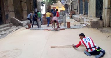 محافظة الجيزة: رصف المناطق غير المخططة بالانترلوك بالهرم والقومية.. صور