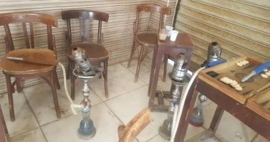 غلق مقاهى تفتح بالمخالفة للقرار الوزارى وتقدم الشيشة فى الهرم.. صور