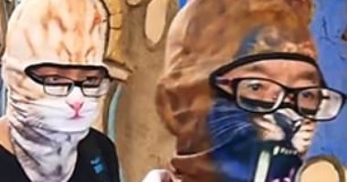 صينيون يستخدمون قناع البحر "فيس بكينى" للوقاية من كورونا.. صور
