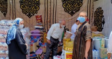 بالكمامة والاجراءات الاحترازية..إقبال السيدات على مبادرة كلنا واحد(صور)