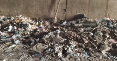 قارئ يشكو من تراكم القمامة أسفل الدائرى بحى كرادسة بمحافظة الجيزة