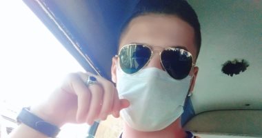 "أحمد" يشارك صورته بالكمامة من بنى سويف والالتزام بالإجراءات الوقائية