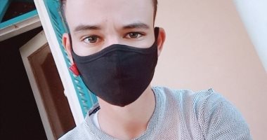 "محمد" من سوهاج يشارك صورته بالكمامة التزاما بالإجراءات الوقائية