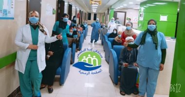 صور.. خروج 14 حالة شفاء من فيروس كورونا بمستشفى إسنا للحجر الصحى