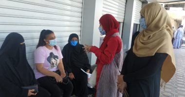 "صحة أسوان" تواصل توعية المواطنين بالتعامل مع "كورونا".. صور