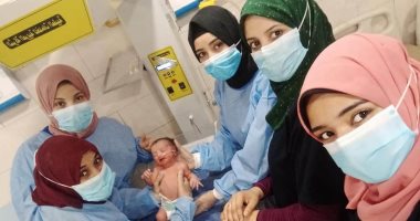 نجاح ولادة قيصرية لمصابة بفيروس كورونا بمستشفى عزل قنا.. صور