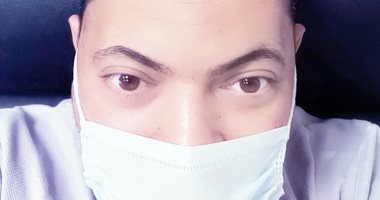 "محمد" من دمياط يشارك صورته بالكمامة التزاما بالإجراءات الوقائية