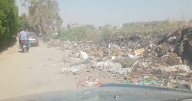 انتشار القمامة بطريق ترعة ترسا فى أبو النمرس بالجيزة
