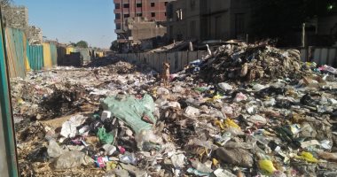 شكوى من تراكم القمامة فى شارع السوق ببولاق الدكرور