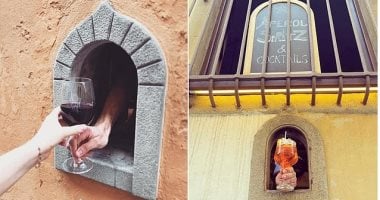 مطاعم إيطالية تعيد فتح نوافذ النبيذ التاريخية لمنع تفشى كورونا .. صور 