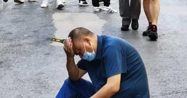صينى يفاجأ بمفتاح ربط حديدى فى رأسه سقط عليه من الدور الثامن.. صور