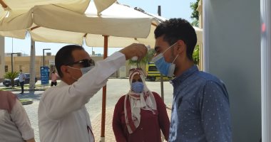 كشف حرارى والتأكيد على ارتداء الكمامة في مكتب التنسيق المركزى.. صور