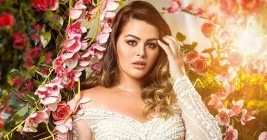 هنادى مهنا تتألق بفستان أبيض فى جلسة تصويرية جديدة وسط الزهور.. صور  