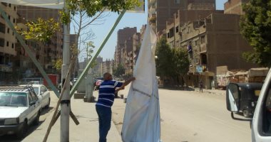 محافظة القاهرة تزيل الدعاية الانتخابية لمجلس الشيوخ من الشوارع.. صور 