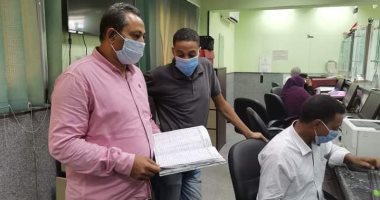 المراكز التكنولوجية بأسوان تواصل تلقى طلبات التصالح فى المخالفات.. صور