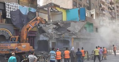 غلق جزئى بشارع فيصل فى الجيزة لإزالة عقار خارج عن التنظيم.. صور