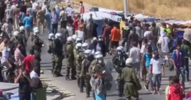مظاهرات للاجئين فى جزيرة ليسبوس اليونانية تطلب المساعدة من ألمانيا بعد الحرائق.. فيديو