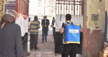 حملة مكبرة لتعقيم مقرات ولجان انتخابات مجلس النواب بأسيوط.. صور