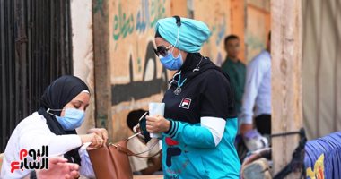 المرأة والشباب والكمامة أبرز مشاهد انتخابات النواب بالعمرانية والطالبية..صور