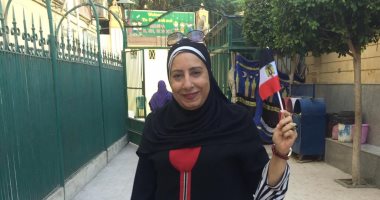 علم مصر يتصدر مشهد انتخابات مجلس النواب فى اليوم الثانى بالعجوزة.. صور