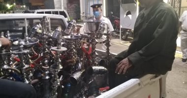 صور.. ضبط 41 شيشة داخل مقهى بالأقصر بالمخالفة لقرار مجلس الوزراء