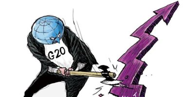 مجموعة العشرين تتصدى لفيروس كورونا وتحمى الاقتصاد العالمى في كاريكاتير سعودى