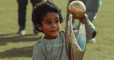 صور جديدة لأبناء نجوم الأهلى على ملعب التتش خلال احتفالية التتويج بـ"الثلاثية"