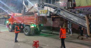  البدء فى كشط شارعى توفيق خشبة و 26 يوليو بحى غرب أسيوط