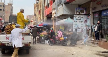 حملات تطهير بحى بولاق الدكرور لمواجهة انتشار كورونا