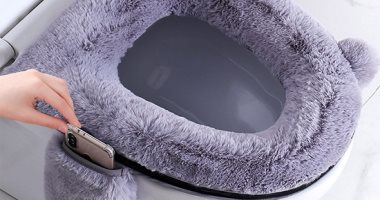 غطاء مرحاض مزود بـ "جراب" لحمل هاتفك المحمول.. رد على مكالماتك فى الحمام براحتك