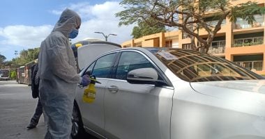 تعقيم وتطهير السيارات الخاصة بفندق منتخبات اليد باستاد القاهرة.. صور
