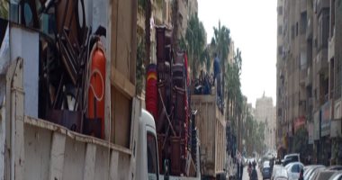 رفع إشغالات بشوارع الجيزة خلال حملات على الأحياء.. صور