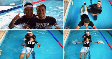 بطل من الصعيد.. "أسامة" حول من المحنة نجاح.. تحدى إصابته بشلل رباعى بعد قفزه فى النيل.. يتدرب على السباحة للوصول لحلم العالمية.. ويؤكد: أتلقى علاج طبيعى ومتفوق فى دراستى بكلية الآداب.. وأحلم بالوصول للأولمبياد