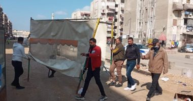 إزالة إشغالات الباعة الجائلين بشارع عبد الرحمن شكرى ببورسعيد لاستكمال أعمال الرصف
