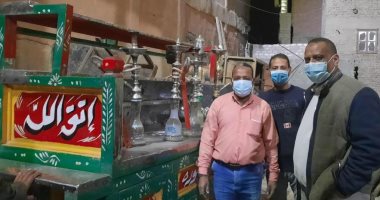 ضبط شيش داخل مقاهى وتغريم مواطنين بدون كمامات بإسنا