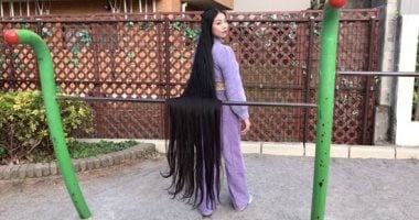 سواد الليل وجماله.. راقصة يابانية تتحدى جينتس للأرقام القياسية بطول شعرها..ألبوم صور