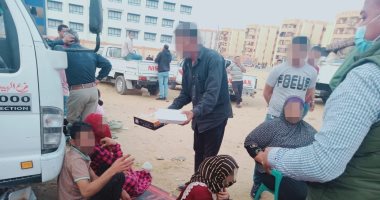 محافظة القاهرة توزع وجبات إفطار على أهالى بطن البقرة بعد نقلهم للأسمرات