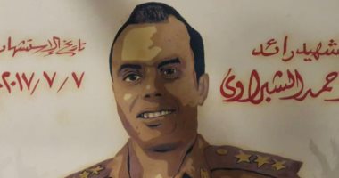 فريق من رسامى الدقهلية يرسمون 30 جدارية مميزة لشهداء الوطن.. صور