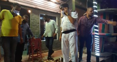غلق 23 محلا ومقهى وتحرير 59 محضر عدم ارتداء كمامة فى حملات بأحياء الجيزة.. صور