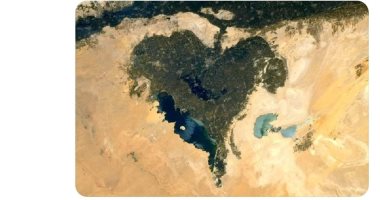 أبناء الفيوم يحتفلون بإهداء رائد فضاء فرنسى صورة للمحافظة على شكل قلب لوالدته