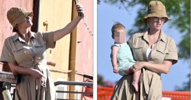 كاتي بيري تلتقط سيلفي في شوارع البندقية.. ووجه ابنتها ما زال غير معروف.. صور
