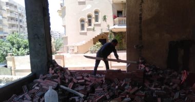 ضبط 33 حالة تحويل وحدات من سكنى لتجارى فى الجيزة.. صور