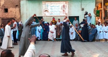 "التحطيب" لعبة الرجال عند الصعايدة.. طقوس مبهجة فى الأفراح بالأقصر "ألبوم صور"