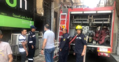 السيطرة على حريق عقار من 3 طوابق فى الدقى.. صور