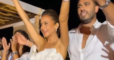 نيللي كريم فى فستان الزفاف الثانى ورامي عاشور يحيى الحفل.. صور