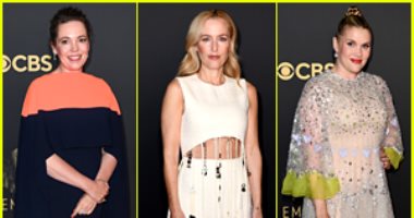 أوليفيا كولمان وجيليان أندرسون وإيميرالد فينيل على السجادة الحمراء لحفل Emmy
