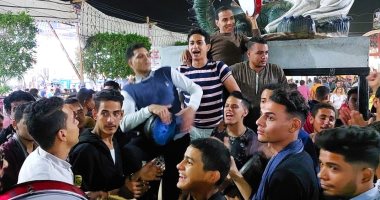 احتفالات مسائية فى رابع أيام مولد دير مارجرجس بالرزيقات وإقبال على شراء الهدايا